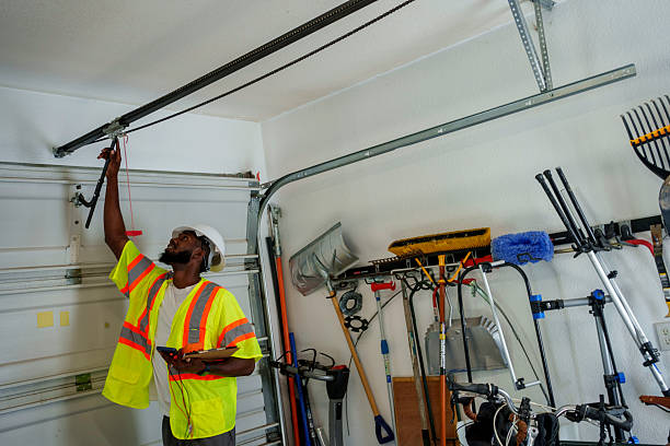 Professional Garage Door technician working in North Braddock, PA